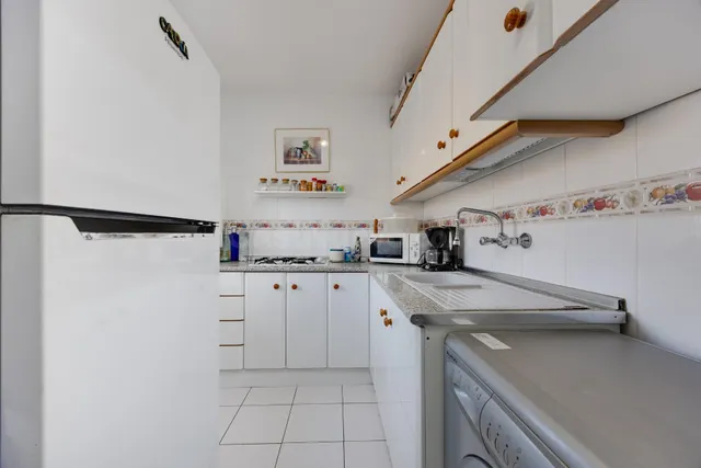 Apartamento de 1 dormitorio con parking comunitario a 240m de la Playa de La Mata — 15
