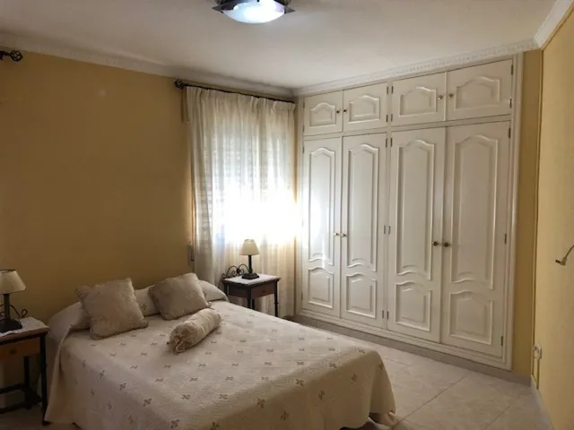 Edificio con piso dúplex y local en planta baja en el centro de Alhaurin de la Torre. — 24