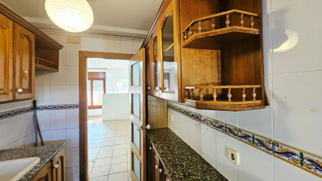 CASA PLANTA BAJA CON 2 VECINOS CON JARDÍN — 29