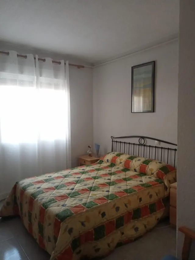 Chalet independiente de una planta con solárium, trastero y jardín consolidado — 11