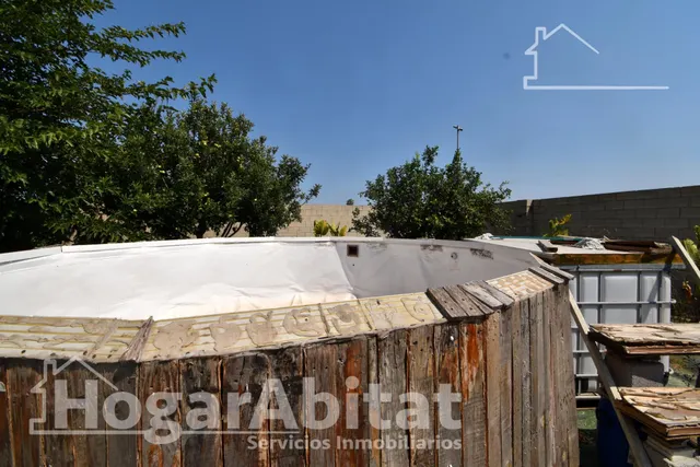 GRAN PARCELA CON VIVIENDA Y AMPLIA TERRAZA — 36