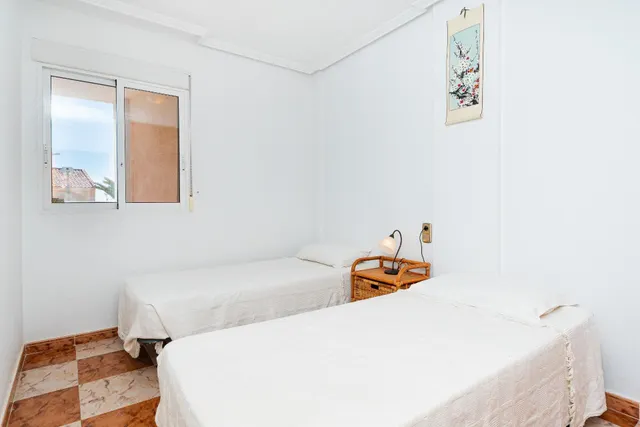 Ático con amplio solárium y piscina comunitaria en Villamartin, Orihuela Costa — 15