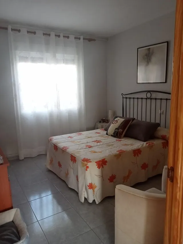 Chalet independiente de una planta con solárium, trastero y jardín consolidado — 9