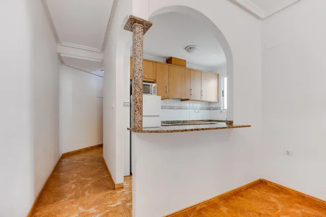 APARTAMENTO DE DOS DORMITORIOS CON VISTAS A LA LAGUNA ROSA Y CON PISCINA COMUNITARIA — 23