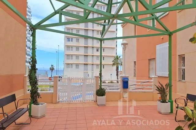 Apartamento en venta con terraza, piscina comunitaria y plaza de garaje, en la manga del mar menor, zona del estacio — 21