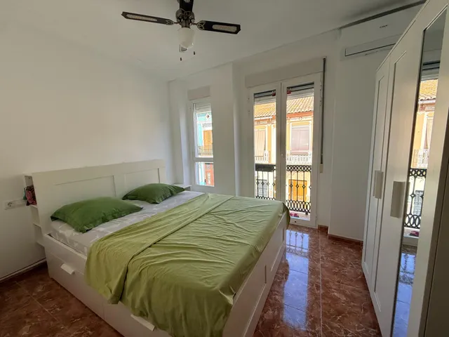 EXCELENTE PISO CERCA DE LA PLAYA, TOTALMENTE REFORMADO, EN 1º PLANTA,  EN UNA CASA TIPICA DEL BARRIO DEL CABAÑAL. — 13