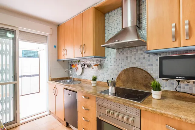 Dúplex amplio de 5 dormitorios con patio, terraza y buhardilla en San José de la Montaña — 8