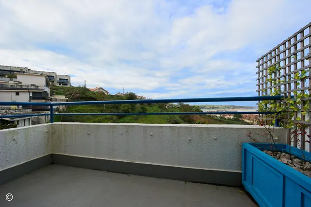 DÚPLEX CON VISTAS, TERRAZA Y 3 GARAJES — 18