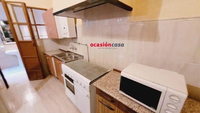 SE VENDE PLANTA BAJA CON COCHERA — 14