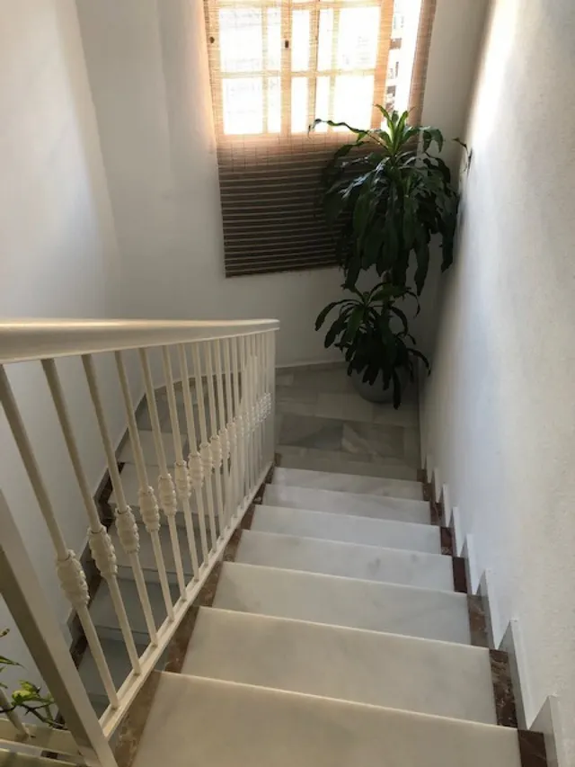 Edificio con piso dúplex y local en planta baja en el centro de Alhaurin de la Torre. — 34