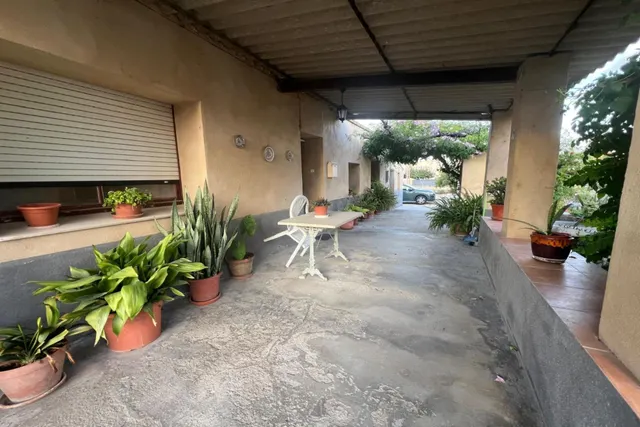Casa tradicional en Deltebre, construida en el año 1918, situada sobre una parcela esquinera de aproximadamente 1.340 m2. — 12
