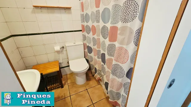 CASA PLANTA BAJA CON 2 VECINOS CON JARDÍN — 12