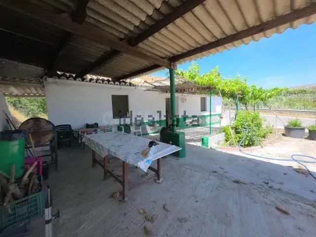 Casa de 100m2 con 2 habitaciones 1 baño con finca rústica de - foto 2