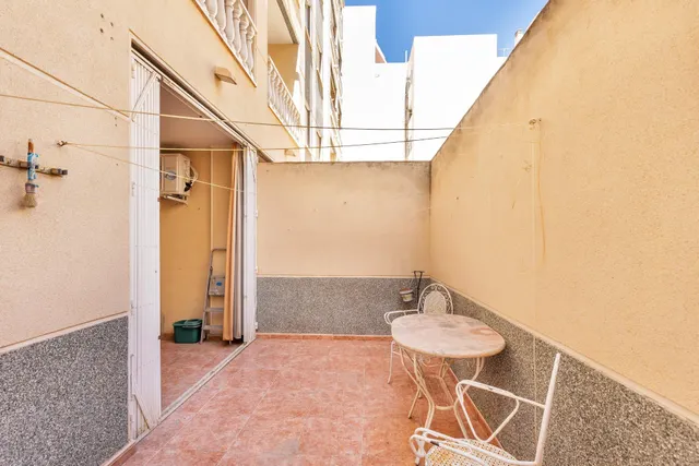 Acogedor piso en planta baja con piscina comunitaria — 17