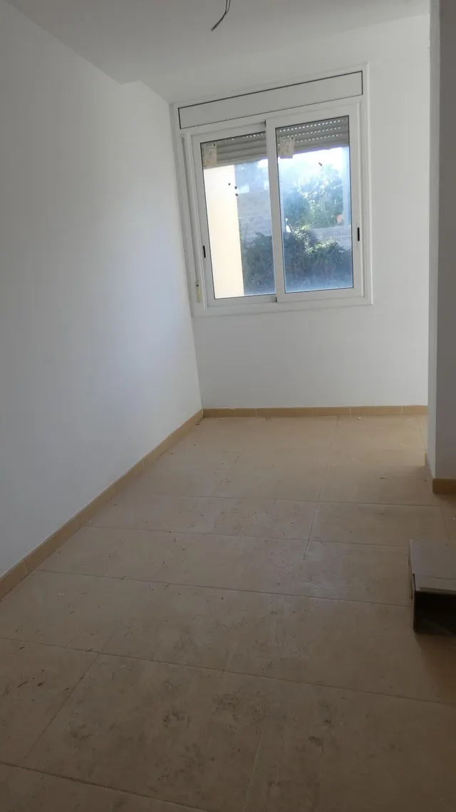 CASA EN CONSTRUCCIÓ A LA LLACUNA — 14