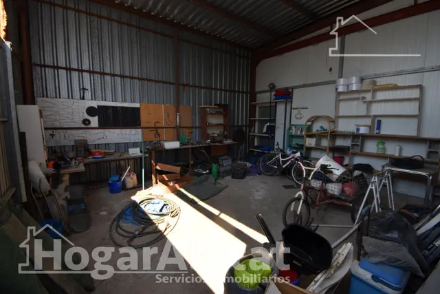 GRAN PARCELA CON VIVIENDA Y AMPLIA TERRAZA — 18