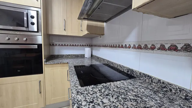 PLANTA BAJA CON 4 DORMITORIOS — 10