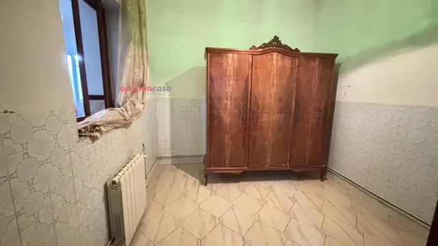 CASA CON PATIO Y COCHERA A LA VENTA — 15