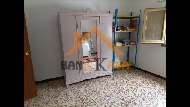 SE VENDE CASA CON LOCAL ABAJO EN FIÑANA ZONA CENTRO — 33