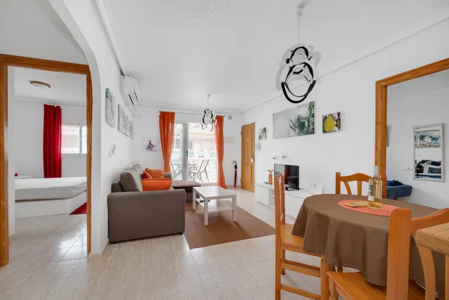 Apartamento dúplex con piscina comunitaria, Alicante, Orihuela Costa. 2 habitaciones, 89 m2, 1,6 kilómetros del mar — 11