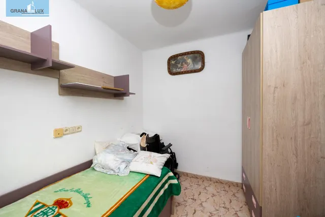 Vivienda en planta baja en el Zaidin. — 14