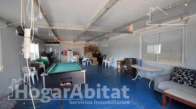 GRAN PARCELA CON VIVIENDA Y AMPLIA TERRAZA — 16