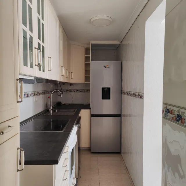 Adosado en Gran Alacant con solárium, balcón y piscina comunitaria — 10