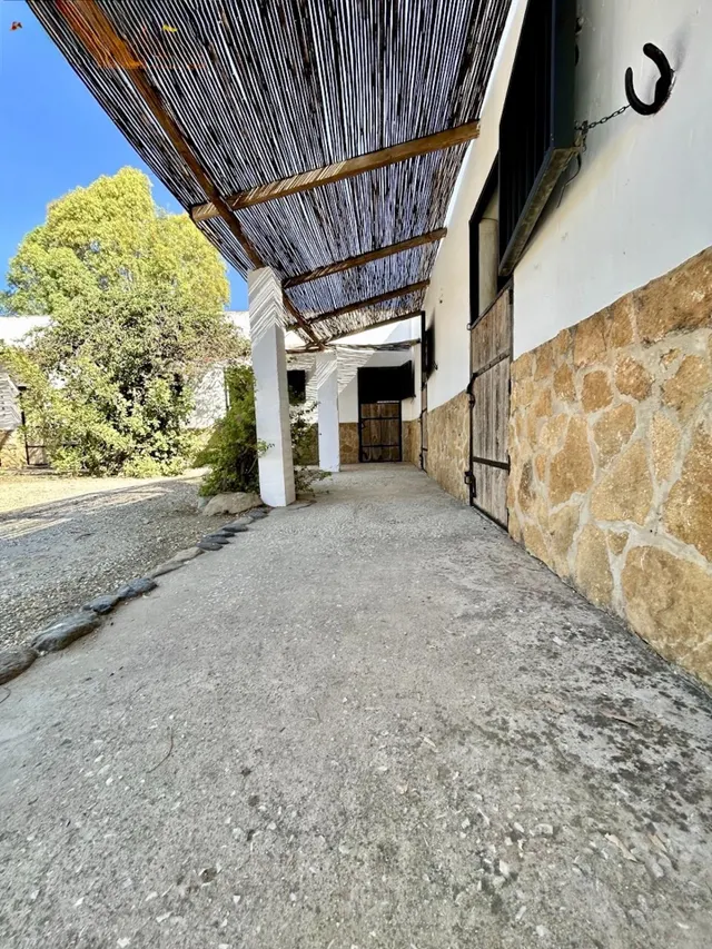 Espectacular finca ecuestre de 32.000 m2 con varias viviendas y piscina en Álora — 24