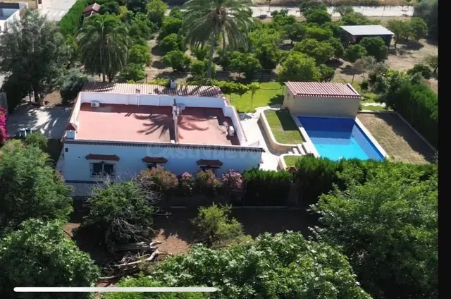 PARCELA URBANA DE 3.600 M2 CON VIVIENDA, PISCINA Y GRAN POTE - foto 3