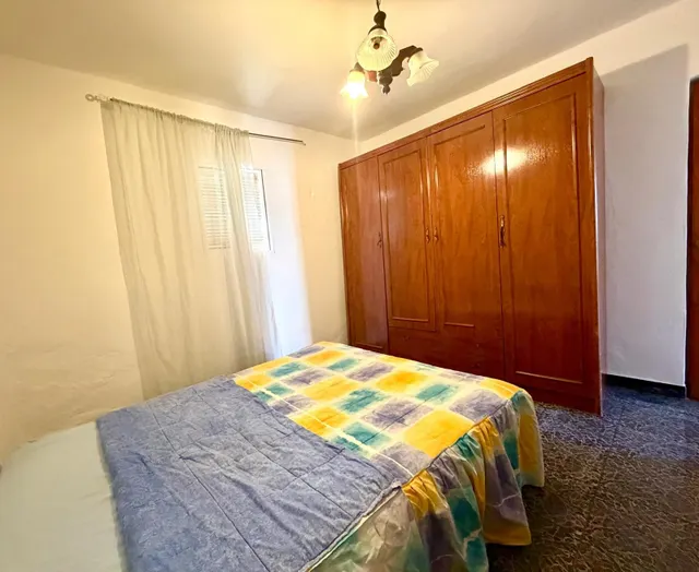 Casa de pueblo en pleno centro de La Joya con dos viviendas independientes y parcela de 500 m2 — 27