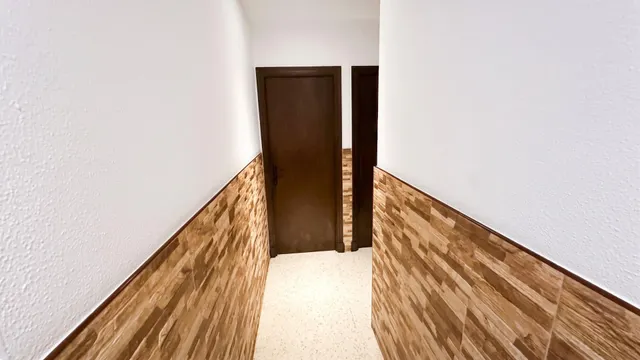 PISO VPO en PLANTA BAJA con PATIO y plaza de GARAJE en la CTRA. de MEDINA. — 12