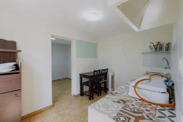 CASA UNIFAMILIAR CON TERRENO URBANO Y GRANDES POSIBILIDADES EN OFRA — 34