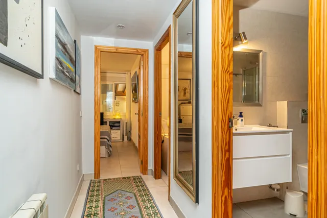 Planta baja totalmente reformada con jardín privado, sauna, piscina comunitaria y parking en Sa Coma — 13
