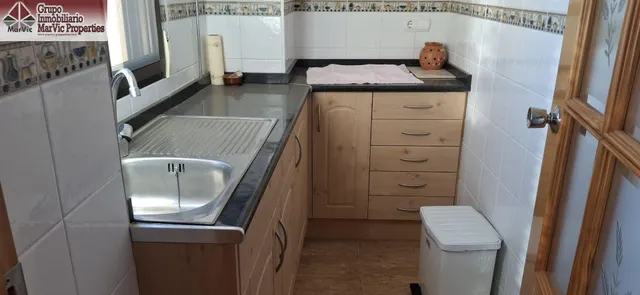 CASA DE DOS PLANTAS EN SELLA CON BUARDILLA — 35