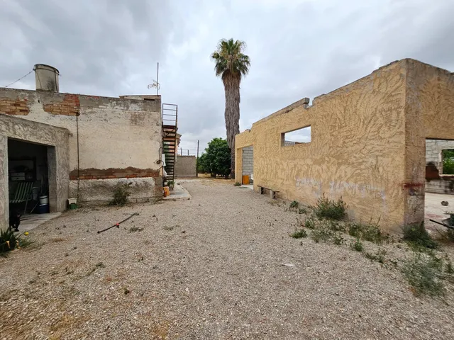 VIVIENDA CON TERRENO — 21