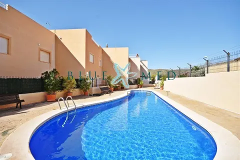 APARTAMENTO EN PLANTA BAJA CON TERRAZAS, PISCINA Y DOBLE APARCAMIENTO EN LA AZOHÍA