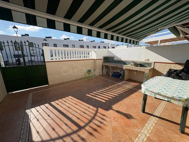 Casa adosada con dos patios privados y piscina comunitaria en Caleta de Vélez — 3