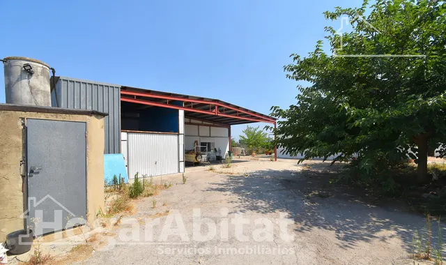GRAN PARCELA CON VIVIENDA Y AMPLIA TERRAZA — 30