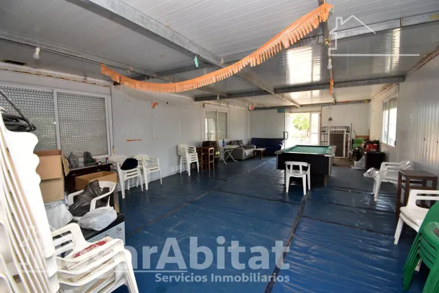 GRAN PARCELA CON VIVIENDA Y AMPLIA TERRAZA — 17