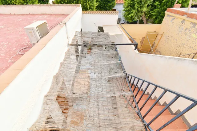 VIVIENDA DE PLANTA BAJA CON SOLARIUM Y COCHERA — 24