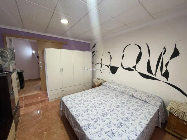 CASA CON TERRENO BENIDORM — 18