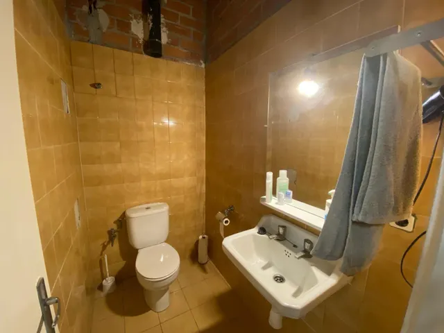 Local en Planta baja adaptado como vivienda con dos locales y superficie total 400m2 — 18