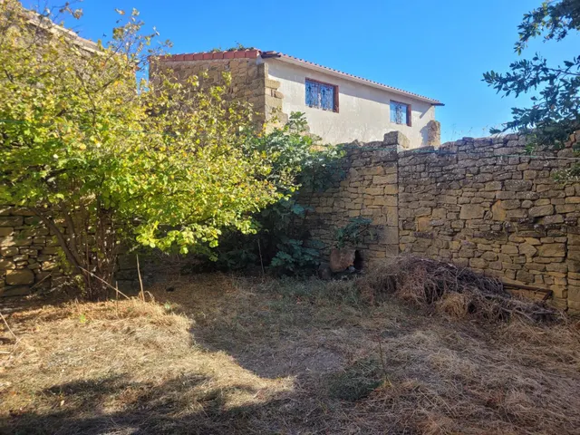 CASA CON CORRAL y TERRENO EN SAN MARTÍN DE UNX — 35