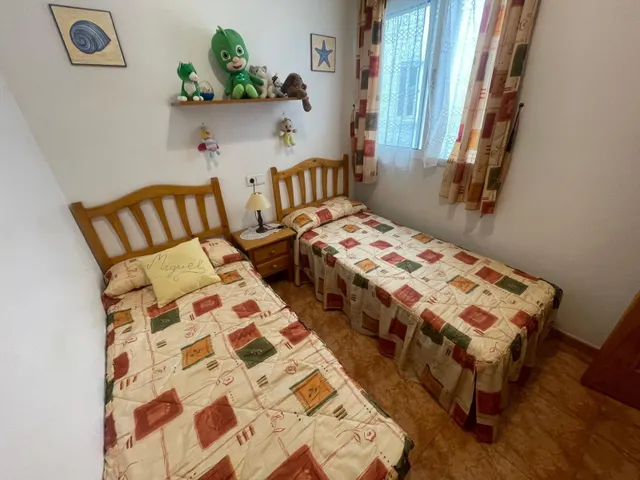 Apartamento con garaje y piscina en el centro de Torrevieja — 26
