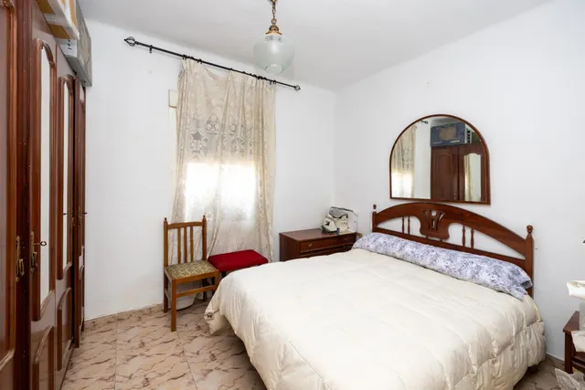 Vivienda en planta baja en el Zaidin. — 12