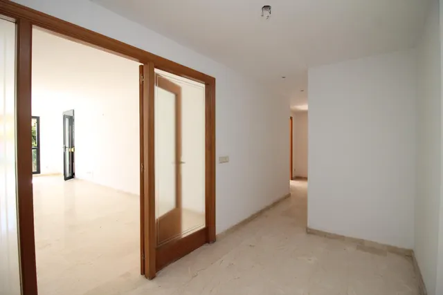 PLANTA BAJA CON JARDIN , GARAJES, TRASTERO Y PISICINA COMUNITARIA JUNTO A MARIVENT — 12