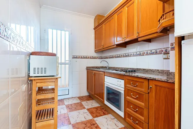 Ático con amplio solárium y piscina comunitaria en Villamartin, Orihuela Costa — 10