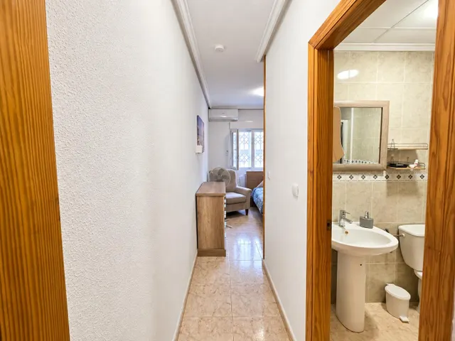 PLANTA BAJA - 2 DORMITORIOS - 2 BAÑOS - 87M2 - PATIO — 18