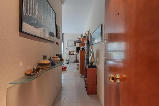 Acogedor piso de 2 dormitorios en el corazón de L'Eixample con posibilidad de alquiler de pk en la misma finca — 27