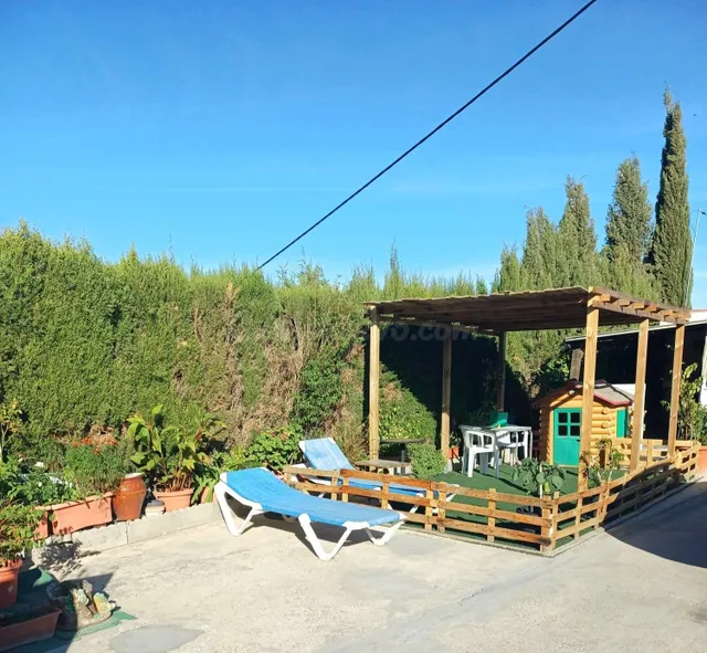 Casa con amplia parcela y piscina en torrecera — 3